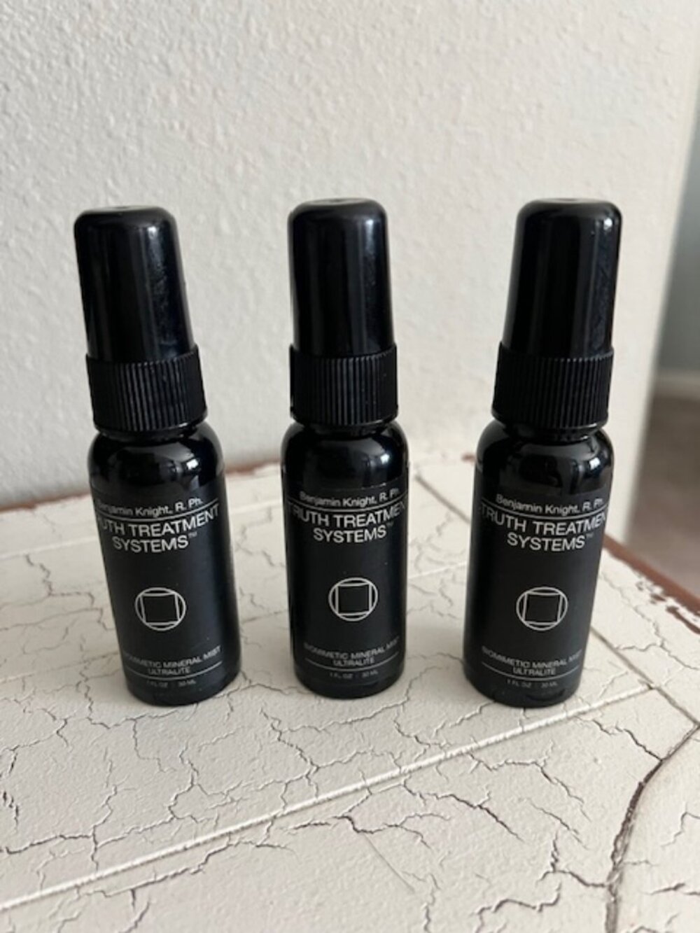 Three bottles of Truth Treatment Systems Biomimetic Mineral Mist